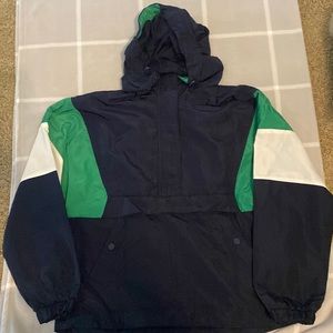 Long sleeved wind resistant hooded pullover